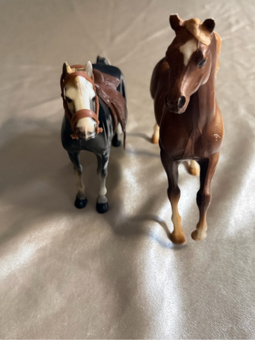 2 vintage  plastic horse figurines. One Marked Breyer/ One Marked Hong Kong